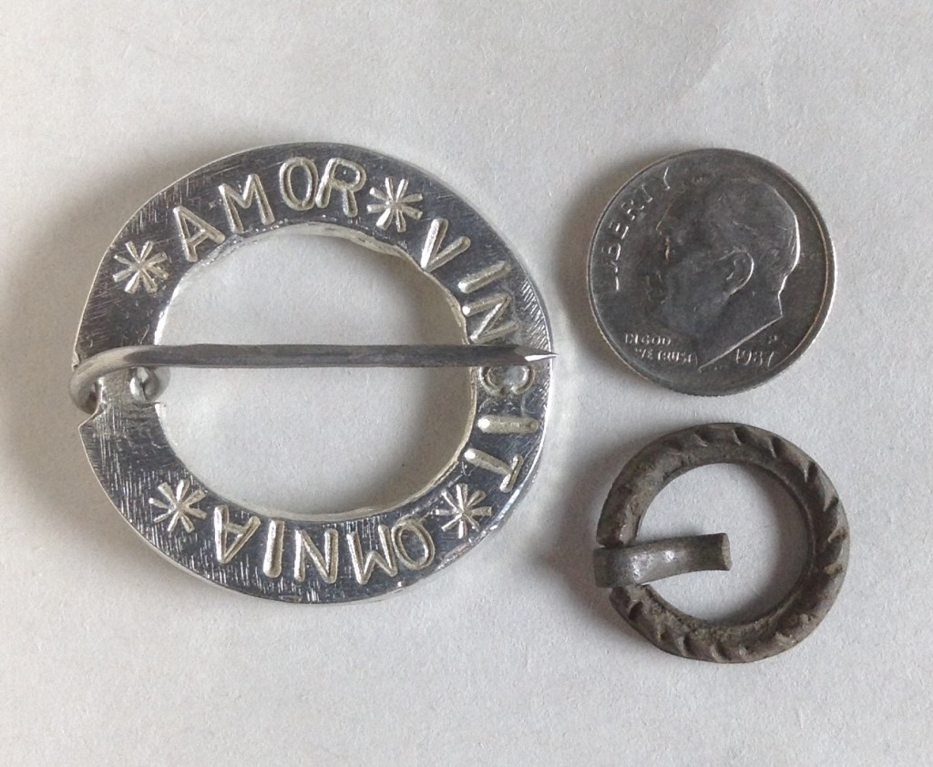 One of my pewter brooches, a dime, and the tiny brooch that I bought.