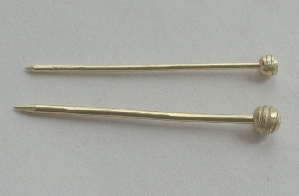two pins